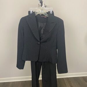 Black pinstripe suit made by Shape FX